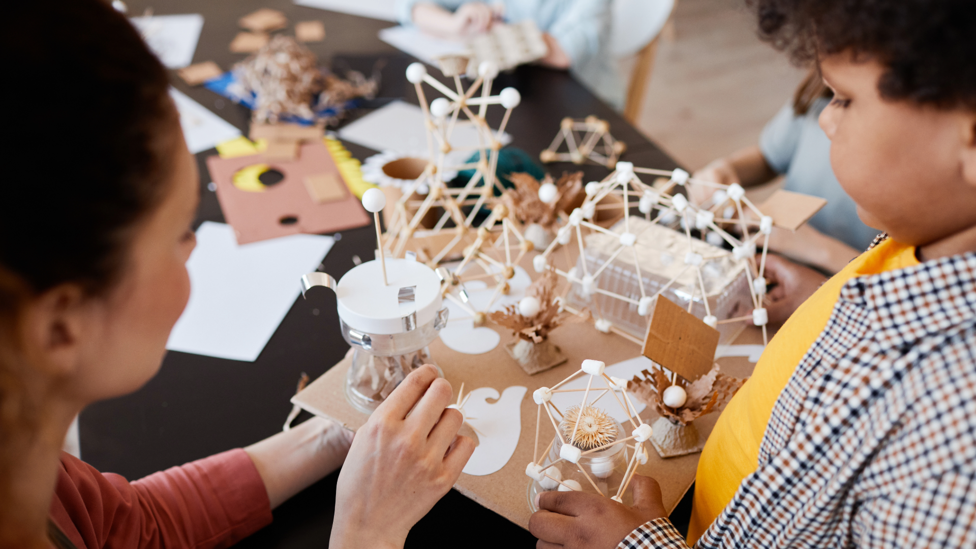 Children working together on a creative art project