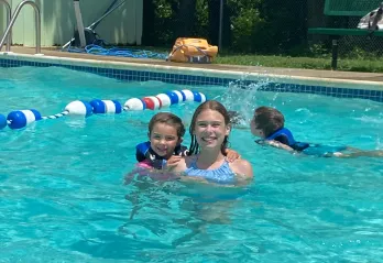 girls swimming in holland pool