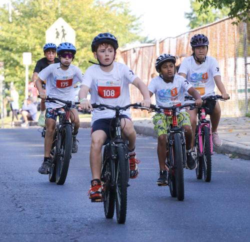 biking at the 2025 kids triathlon