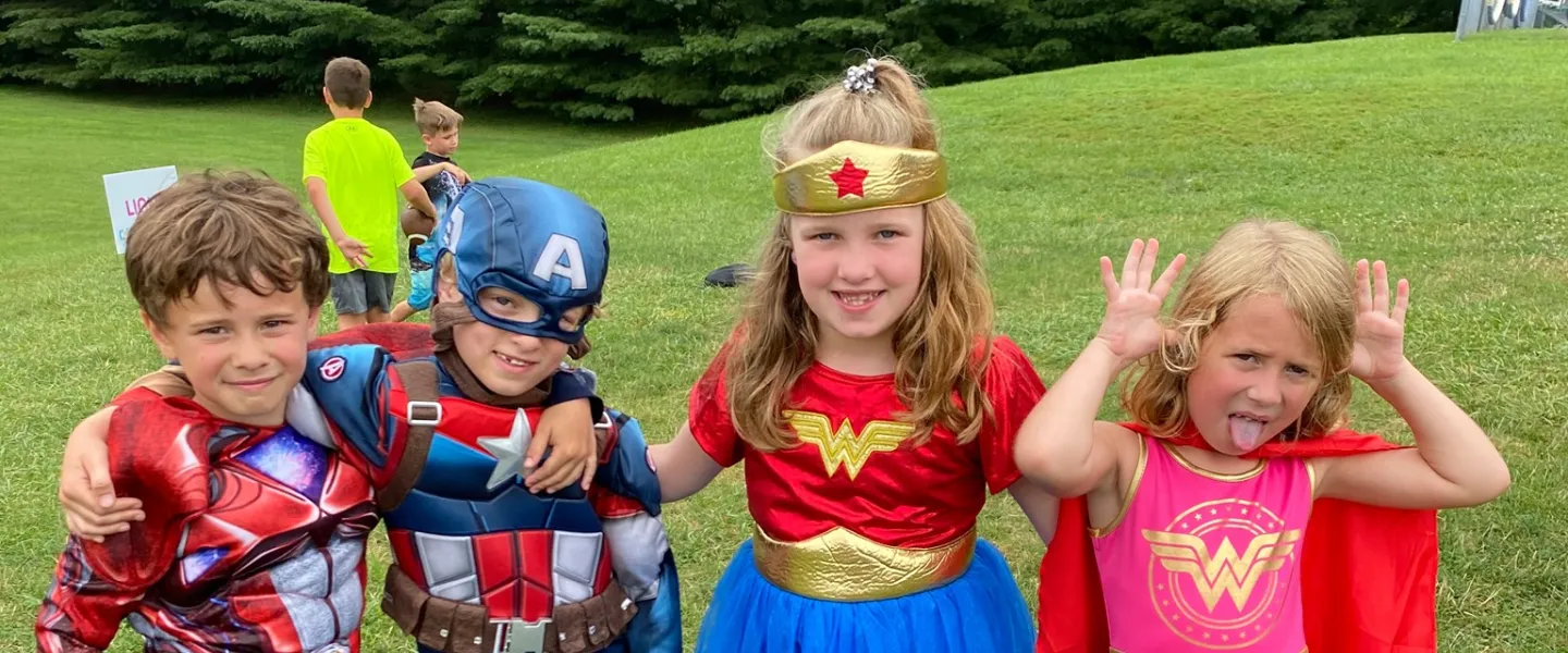 campers dressed as superheros