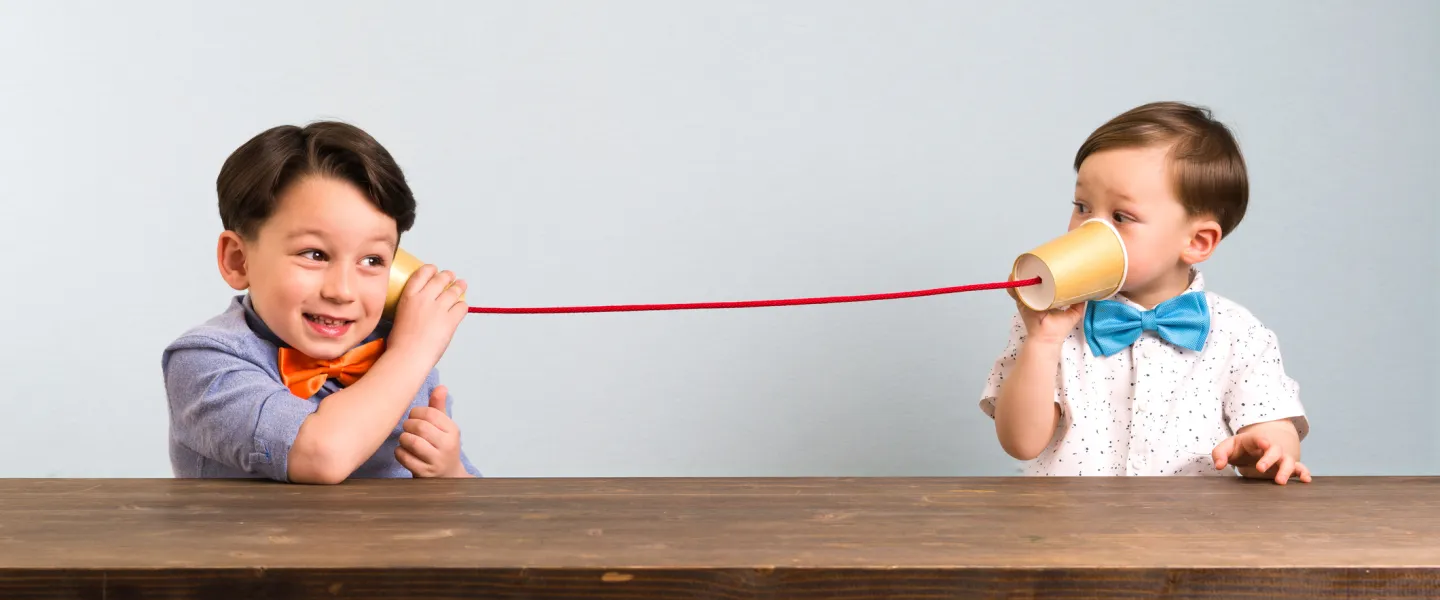 kids playing telephone