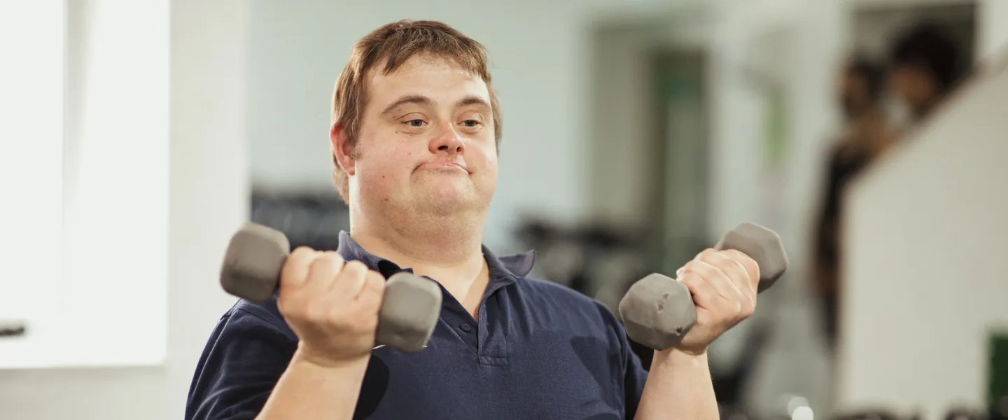adult with special needs in fitness center