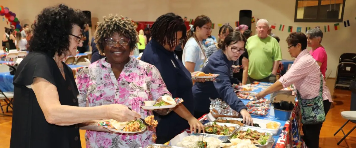 welcoming week pot luck
