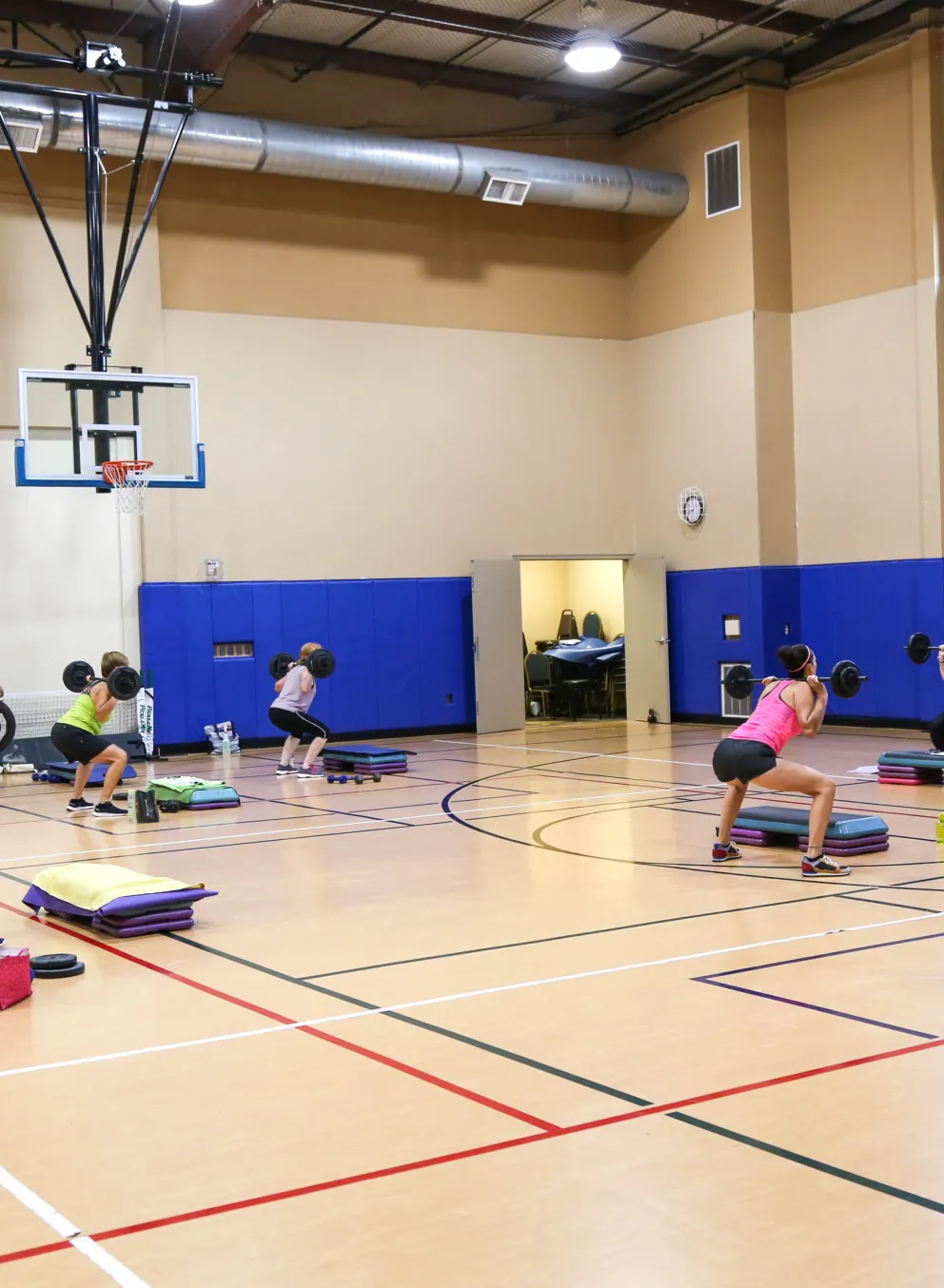 group exercise class in gymnasium