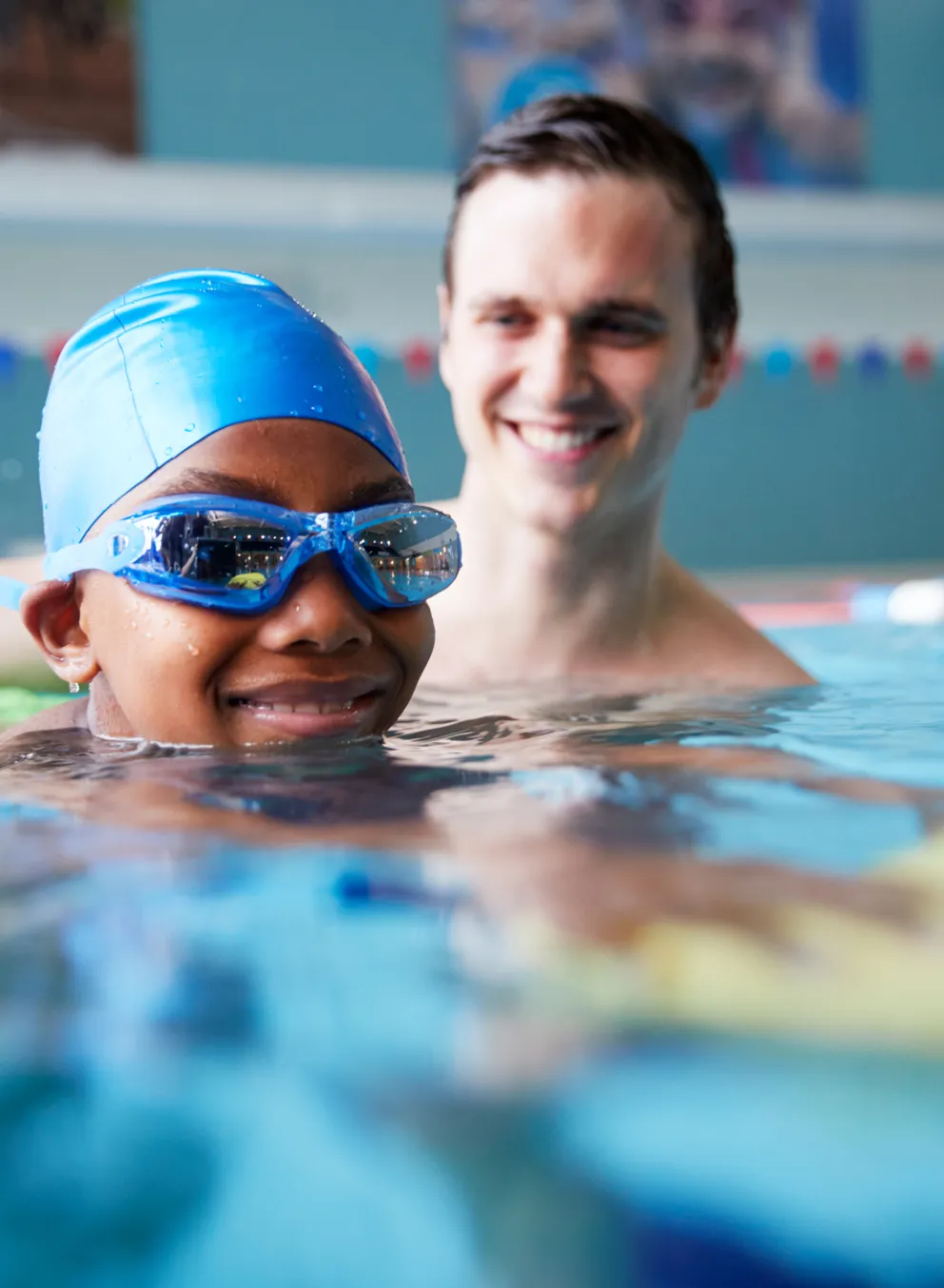 private swim lesson with student in pool
