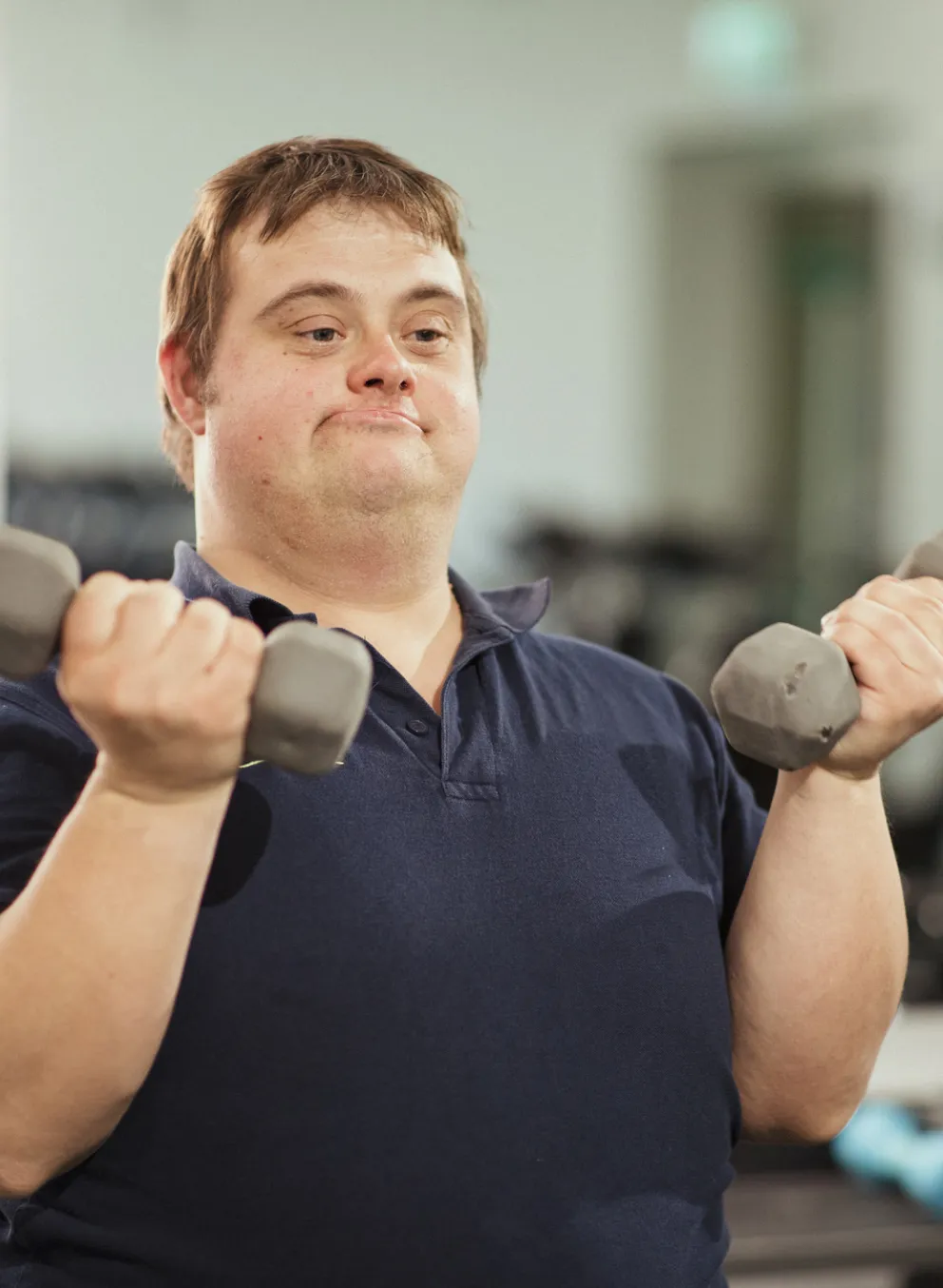 adult with special needs in fitness center