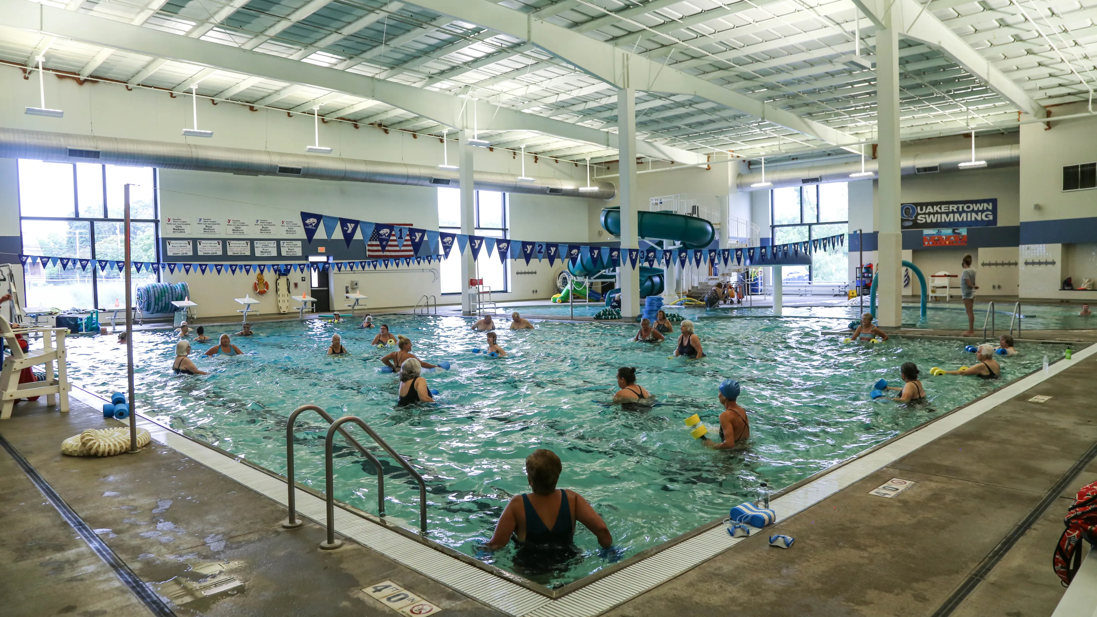 people in pool using recreationally