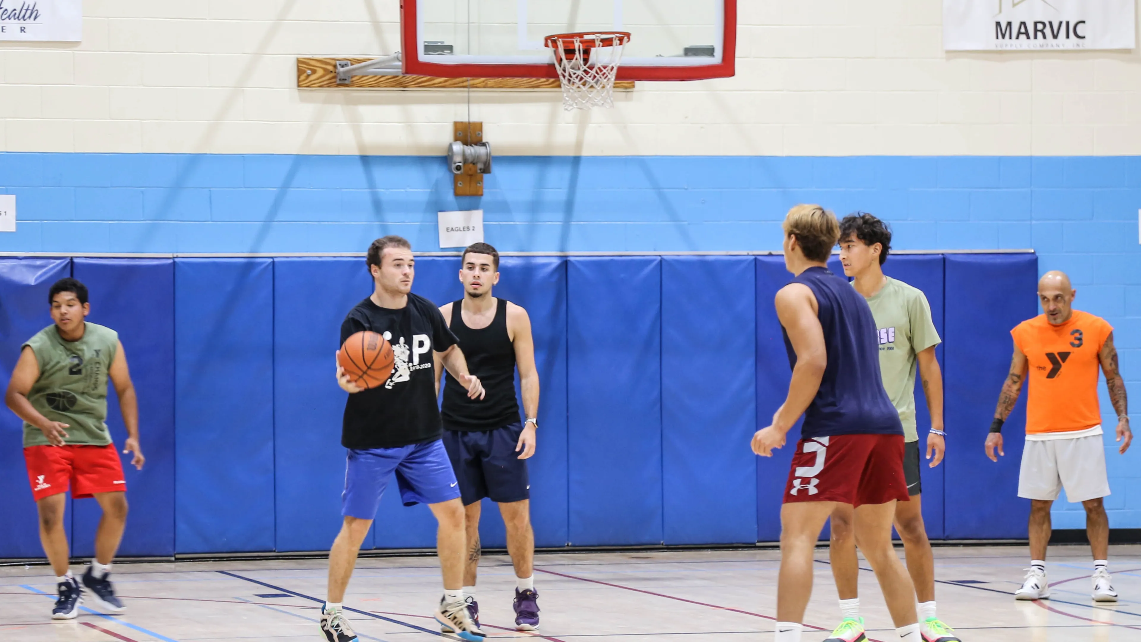 men playing basketball