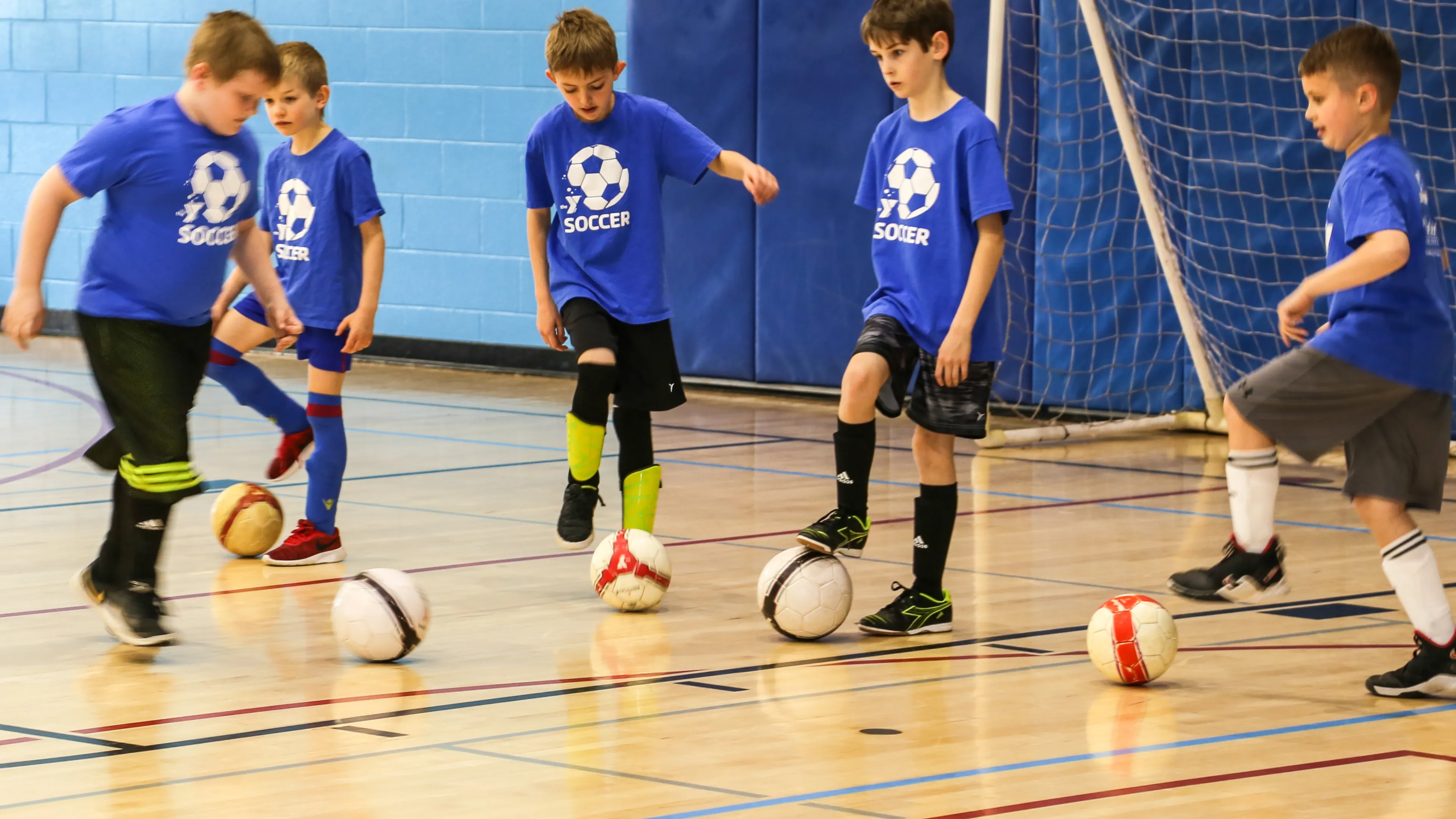 kids playing indoor soccer