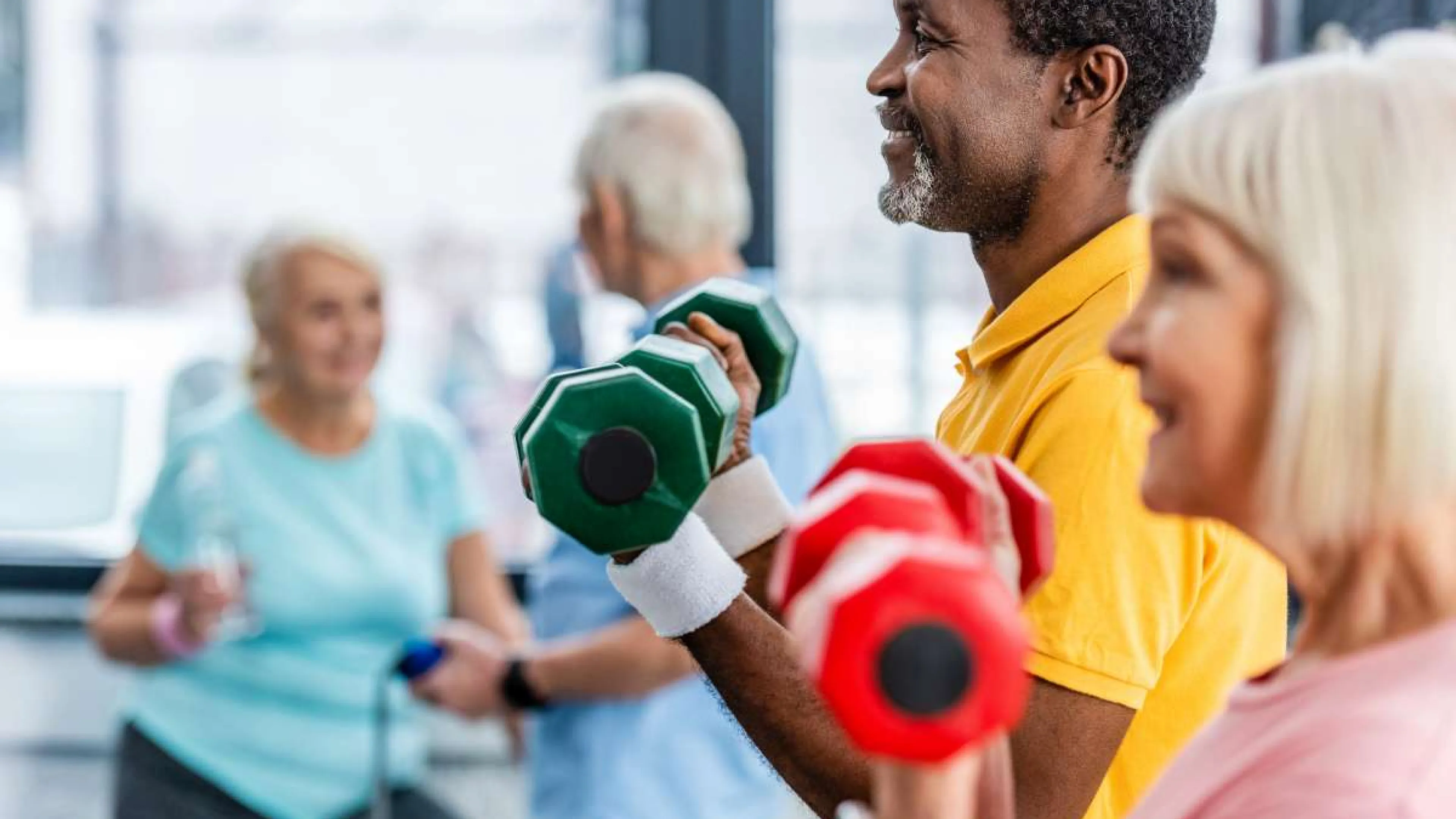 seniors exercise with weights