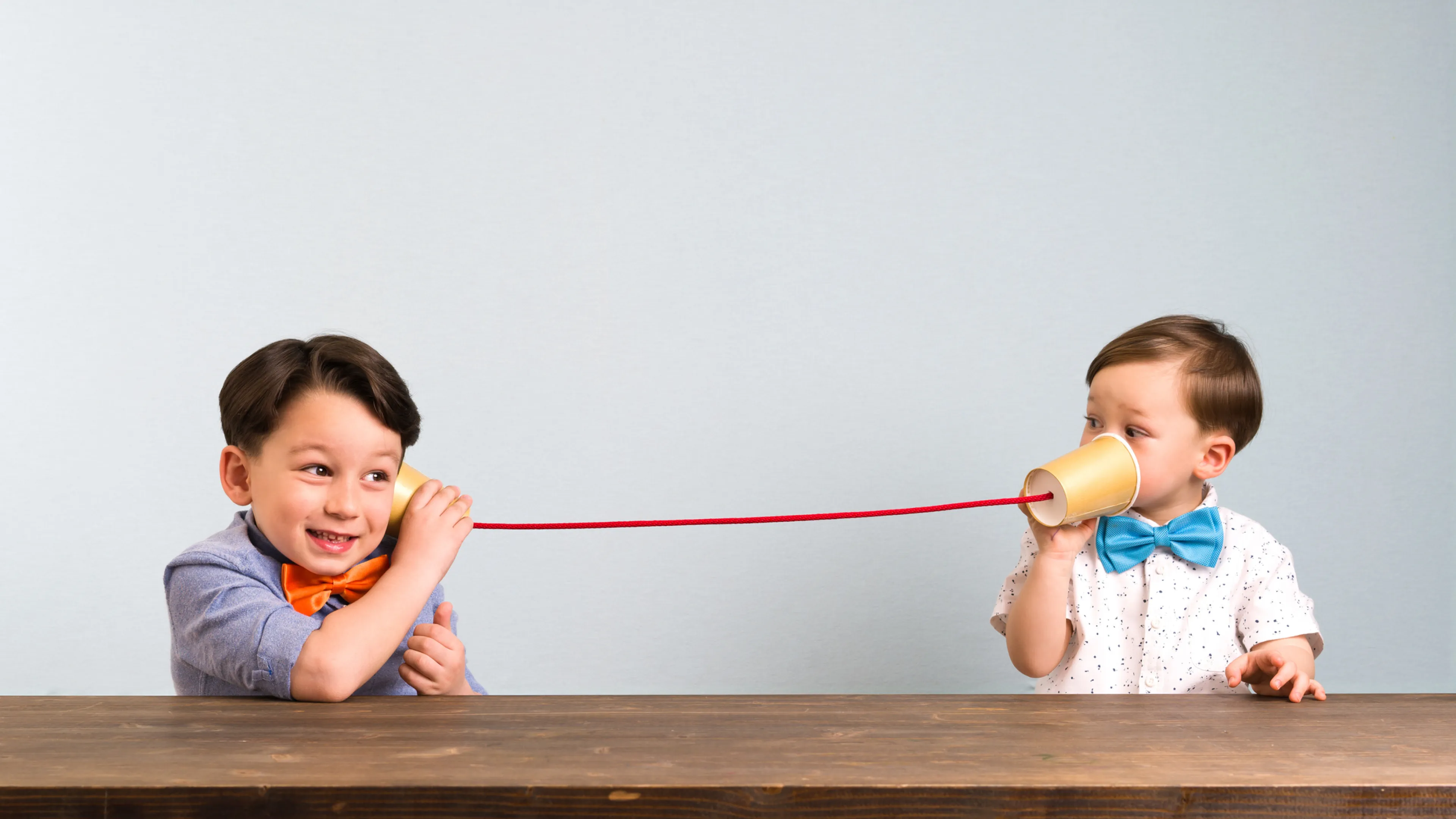 kids playing telephone