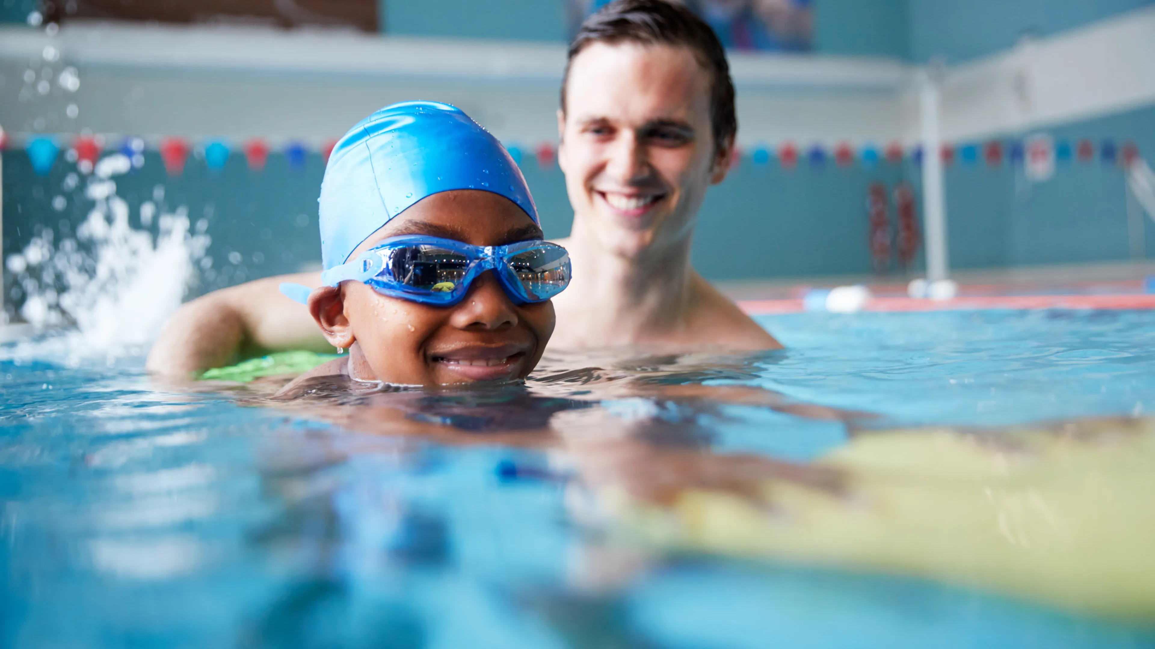 private swim lesson with student in pool