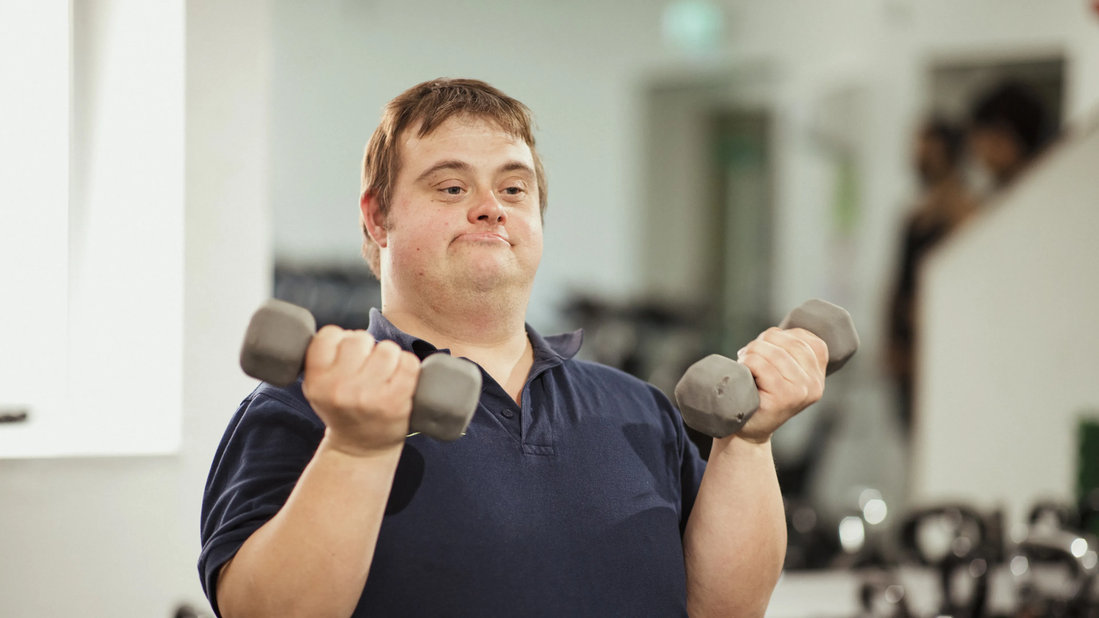 adult with special needs in fitness center