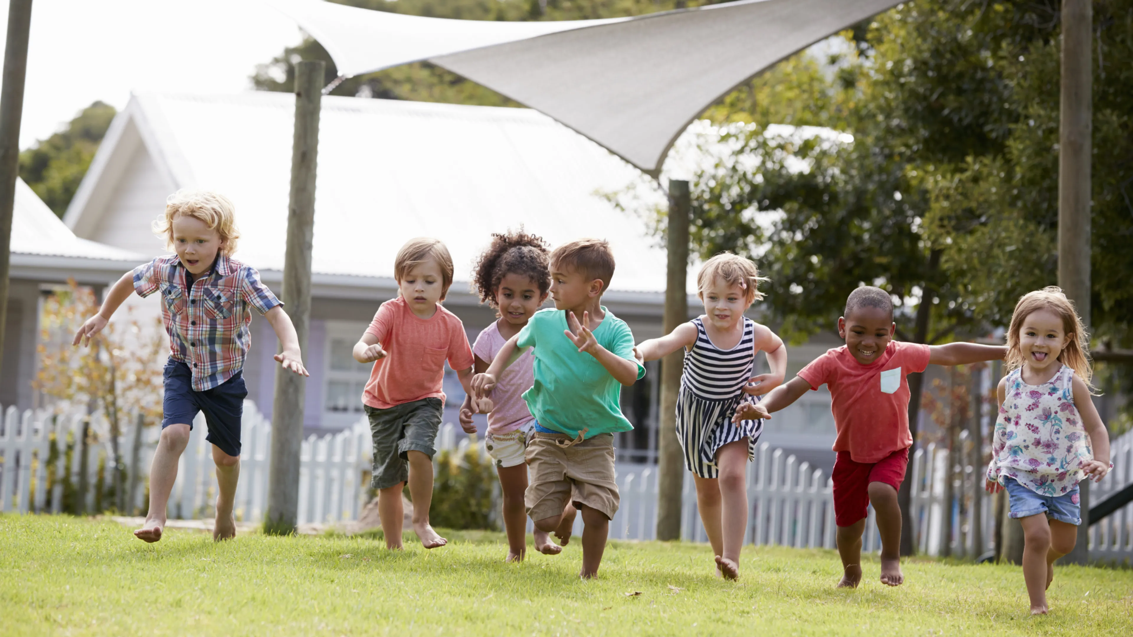 preschoolers running outdoors