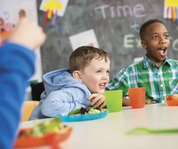school age kids at table