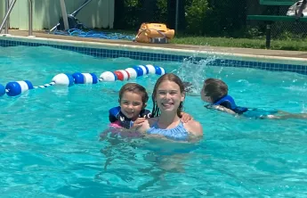 girls swimming in holland pool