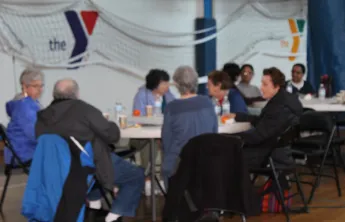 seniors sitting at table